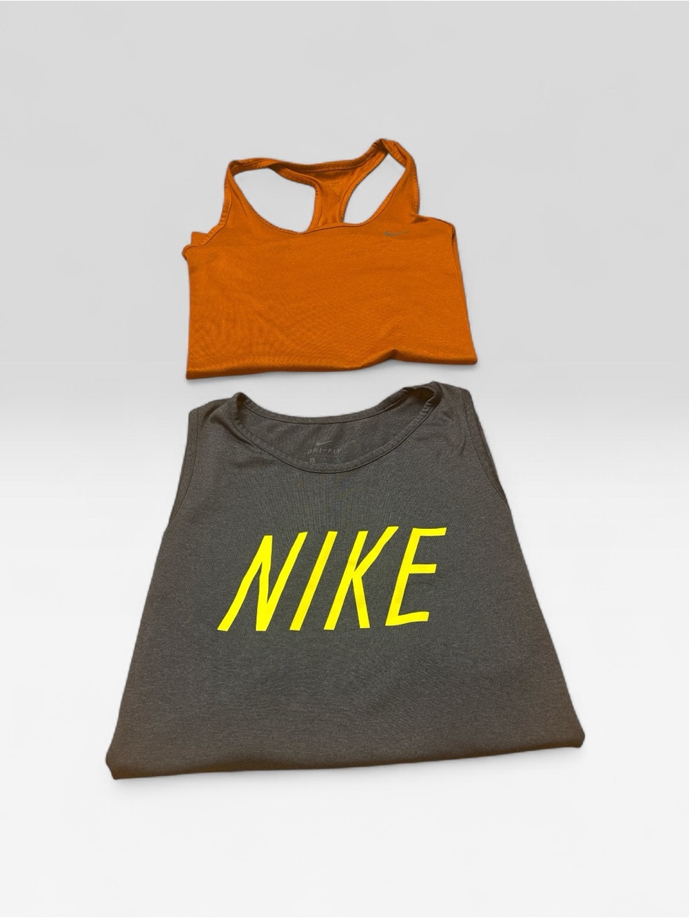Two Nike Women’s Sleeveless Logo Tank Tops- Gray with Yellow Logo & Rust Color